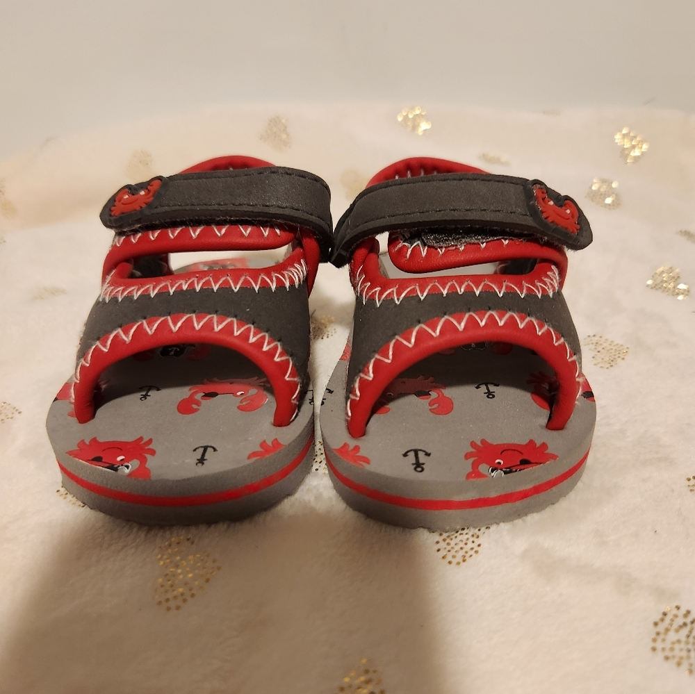 Cute infant crab sandals. Size 2.